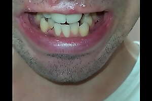 A mouth (teeth and tongue) play
